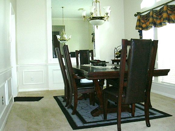 DINING ROOM - Walk into an elegant, sun filled Dining Area.