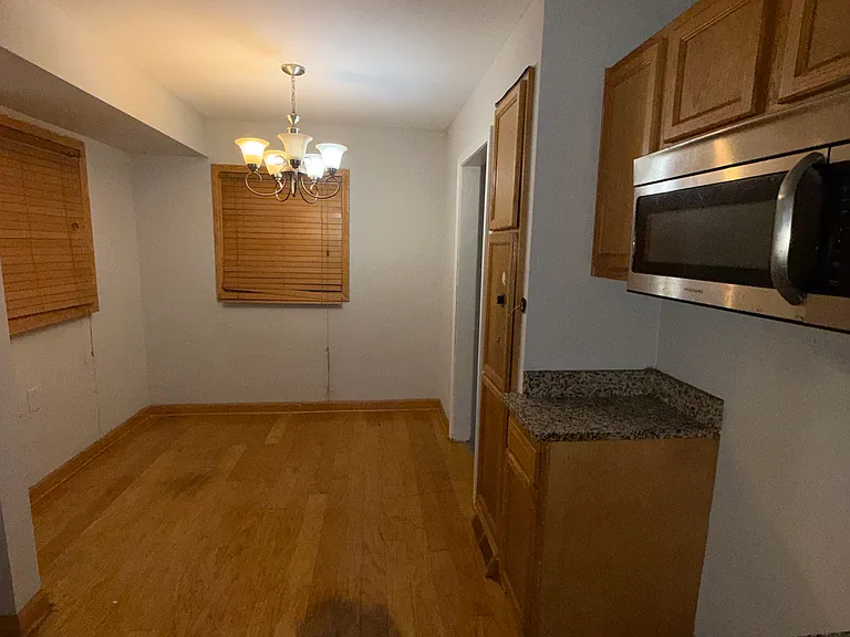 Kitchen with built-in microwave
