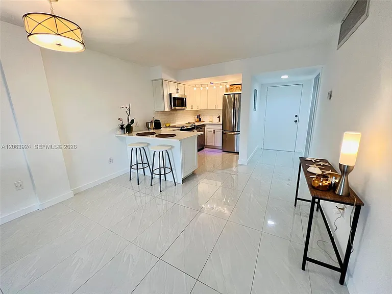 1650 NE 115th St #408 — Photo 14