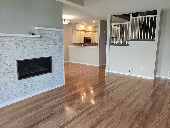 Living room with view of kitchen