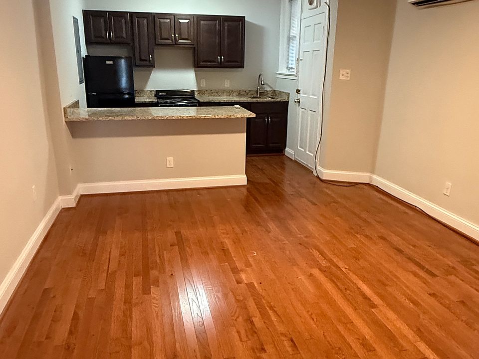Living Area adjacent to kitchen counter/bar