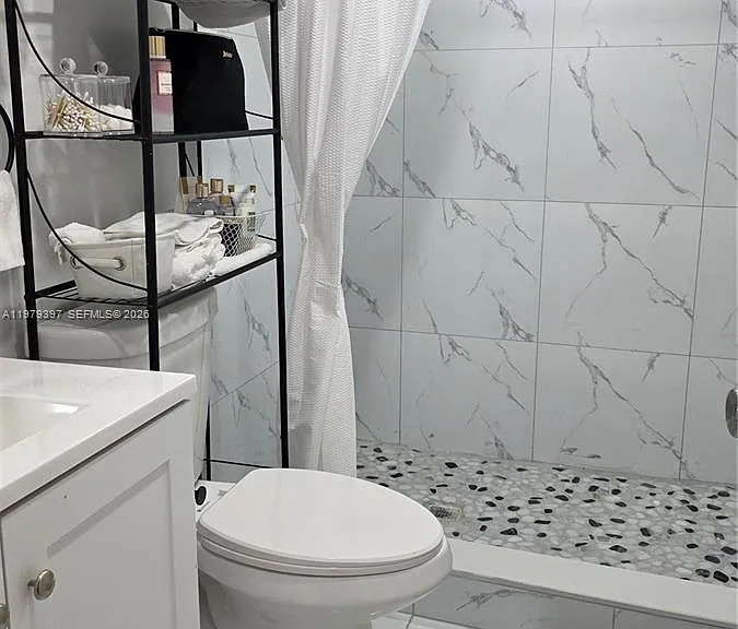 750 NE 199th St #101H — Photo 27