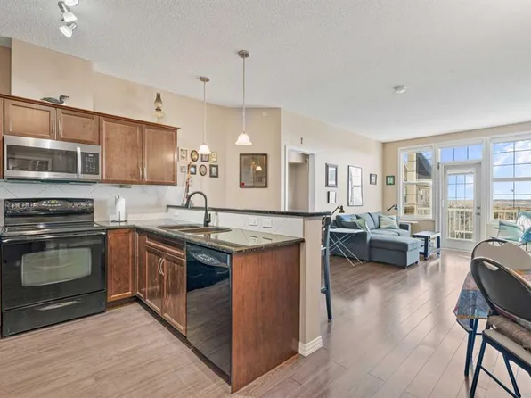 1 N Crystal Green Ln #410, Okotoks, AB T1S 0C5