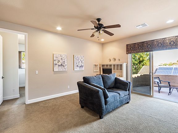 your private sitting area with a TV and desk
