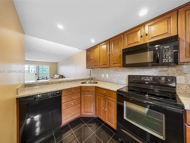 6075 N Sabal Palm Blvd #210 — Photo 2