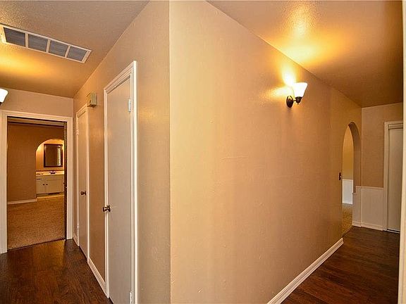 Hall angle view to master bedroom and living room.