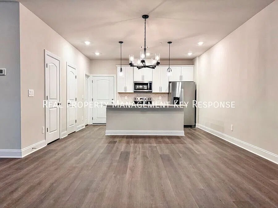 3-Bedroom Harbor Crossing Home with Open Living & a Two-Car Garage — Photo 4