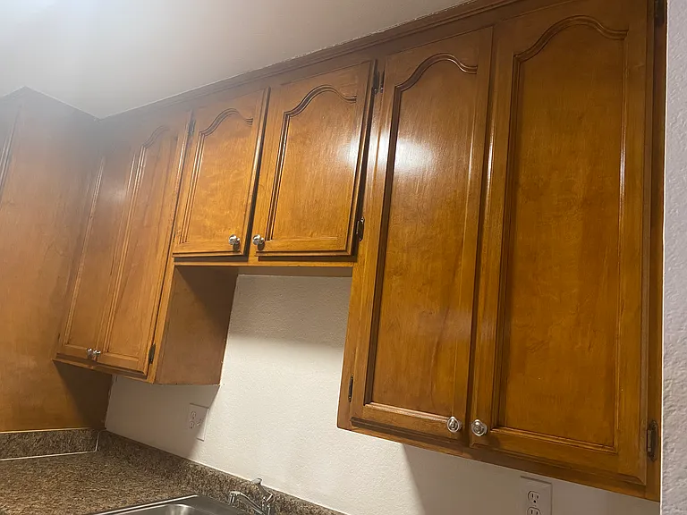 Hardwood cabinets.