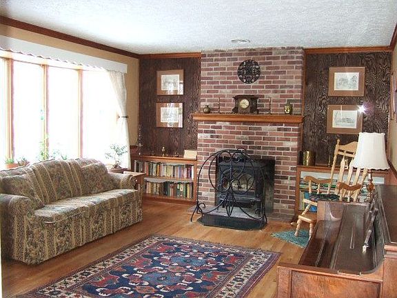 Living Room w/ bow window and new wood stove