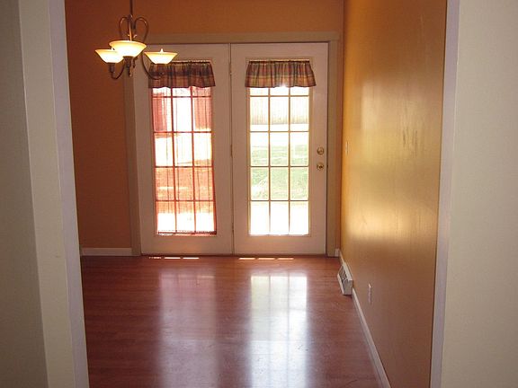 Just inside front door looking into dining room.  LR on left.