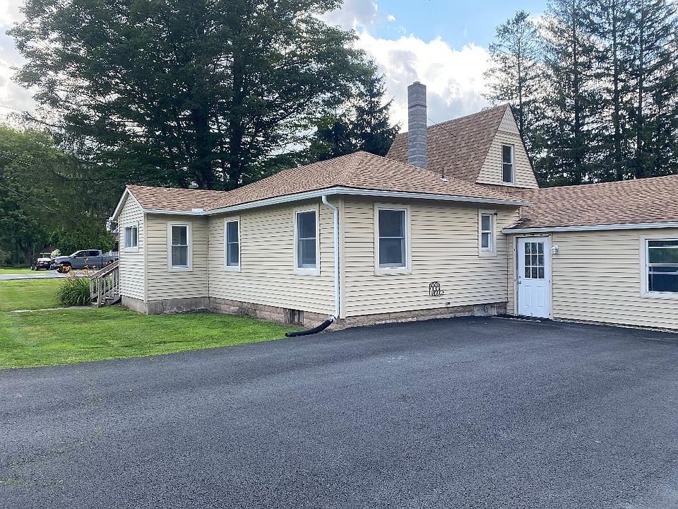 NEW PAVED DRIVEWAY COMES WITH TWO PARKING SPACES