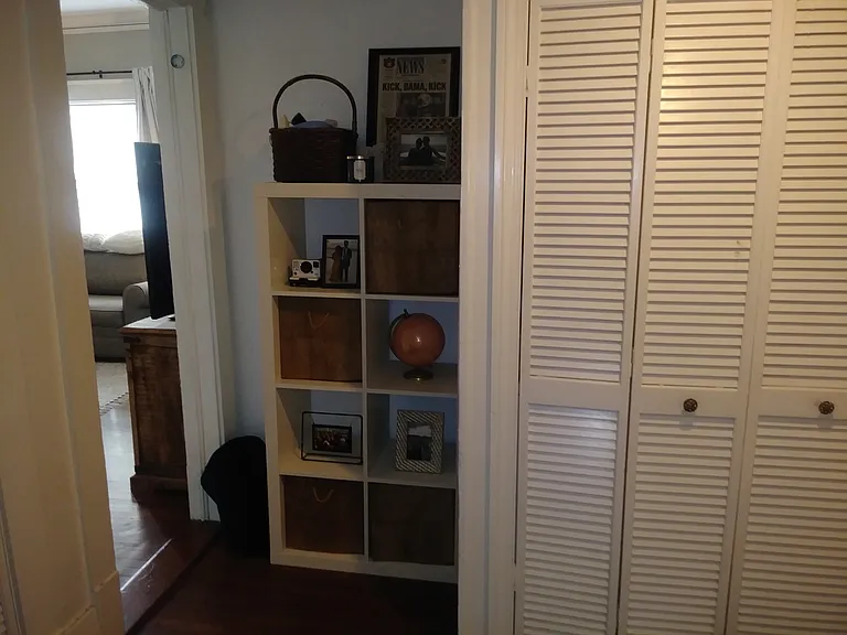 Hallway accessorized by previous tenant.