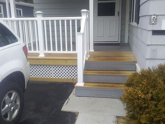 Expanded front porch & new railings