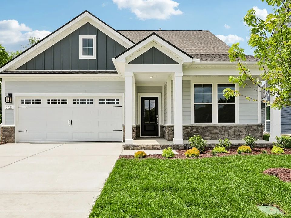 Front exterior with 2-car garage