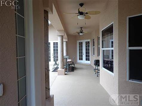 View from the Front door. To the left is the detached bedroom and bath. French doors straight ahead are the front doors and doors to the left lead to the Master Bedroom