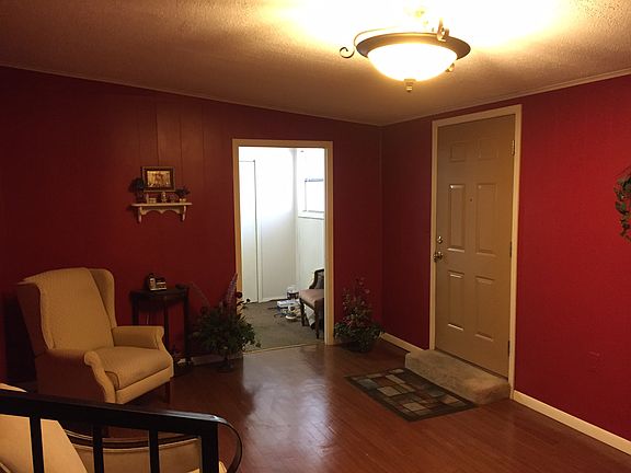 Den area with laundry area