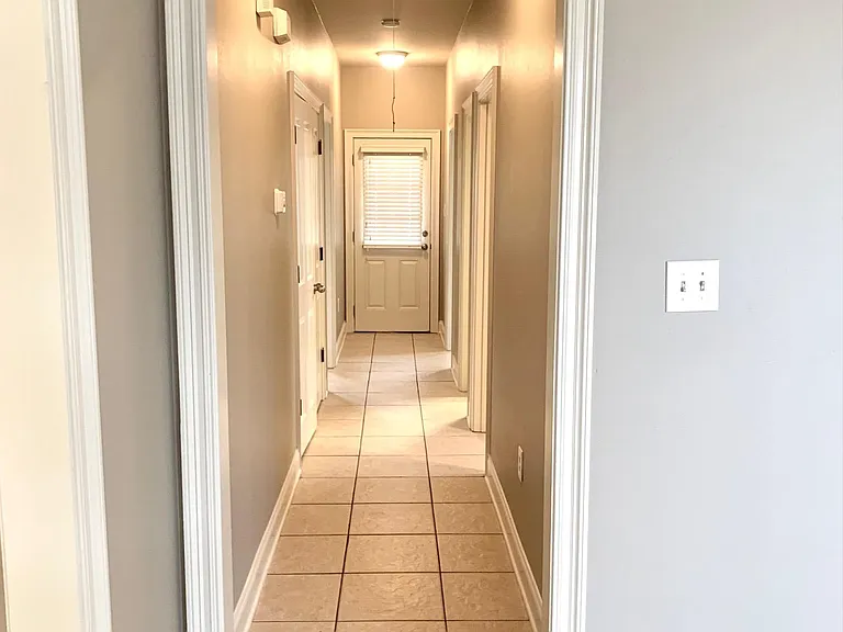 hallway to bedrooms and baths