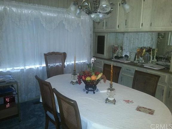den currently being used as formal dining room