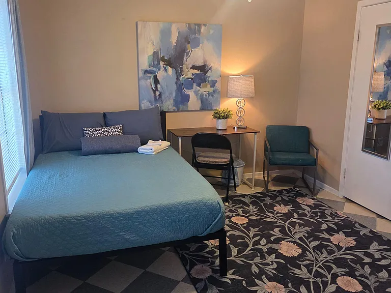 Room E, full sized bed