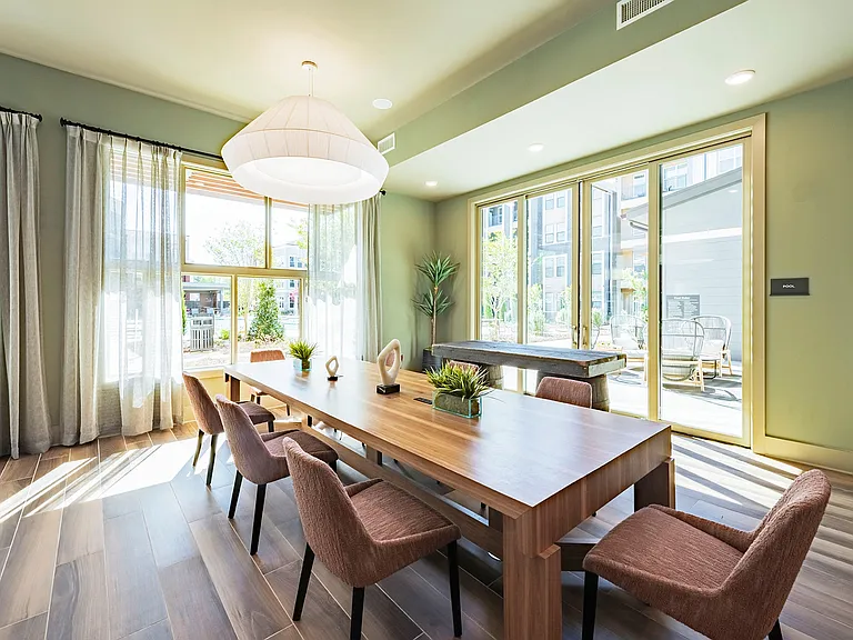 Resident Lounge with Dining, Seating Areas, and TV
