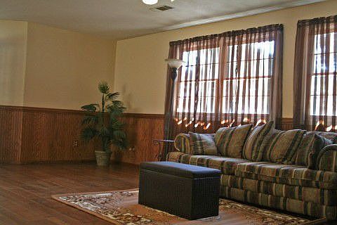 view of living room area. Beautiful oak flooring.