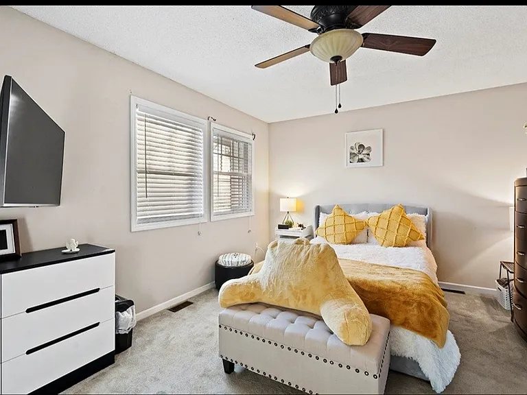Bedroom with full bed. Some decor has changed.