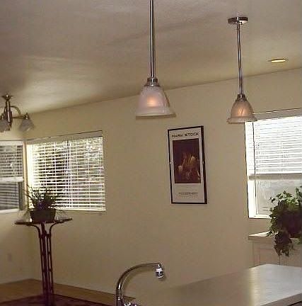 Island and sink looking into dining area.
