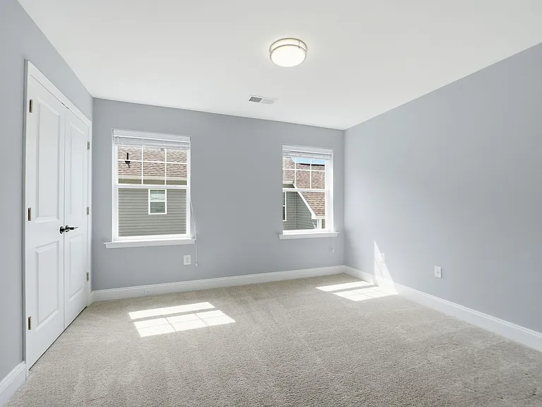 Two of three large upstairs bedrooms with closet (in addition to upstairs master).