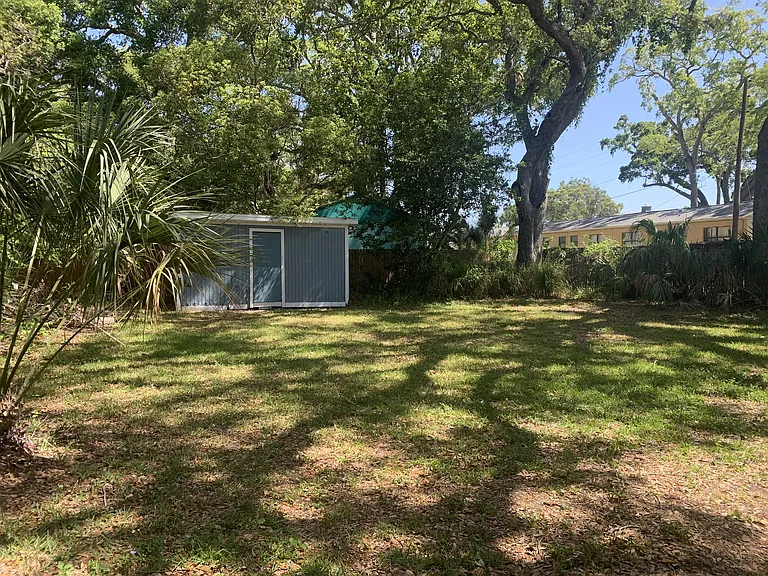 Backyard with Shed for Use.