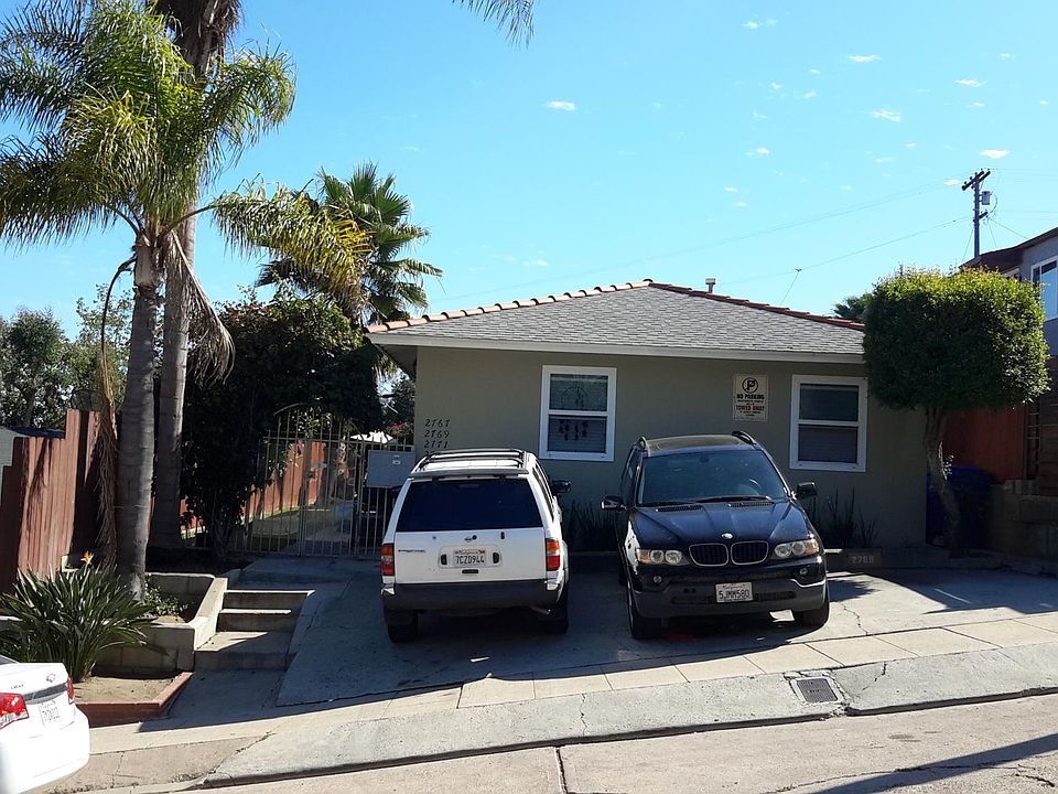 Front of the property. Property is secured with a gated entrance.