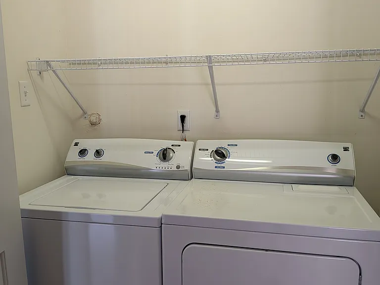 full size washer and dryer with usable shelving