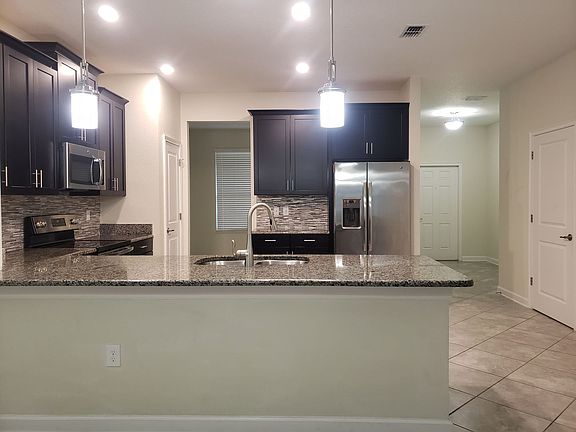 4th image of 11113 Sycamore Woods Dr