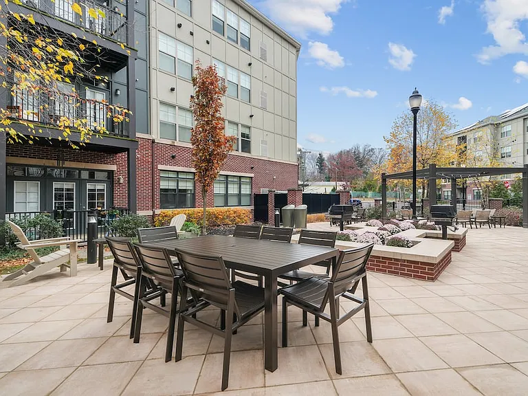 Courtyard with picnic tables and BBQ grills
