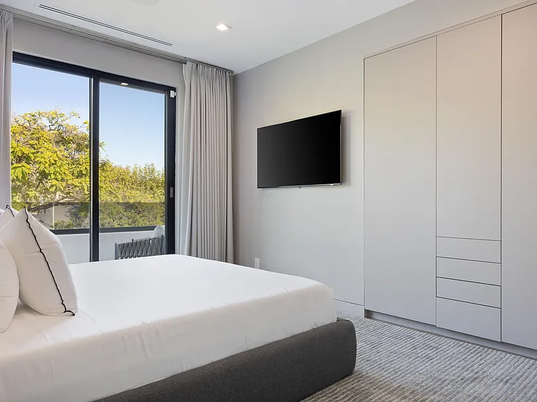 Ample closet space and relaxing view from balcony
