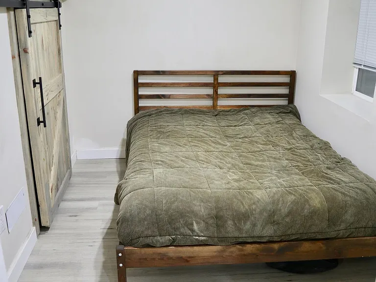 second bedroom is smaller but accommodates a queen size bed