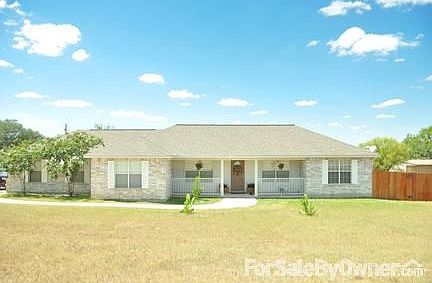 20x20 workshop/garage WITH electricity and a 10 foot covered patio area.