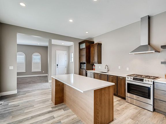 Spacious and Bright Kitchen + Gathering Area.