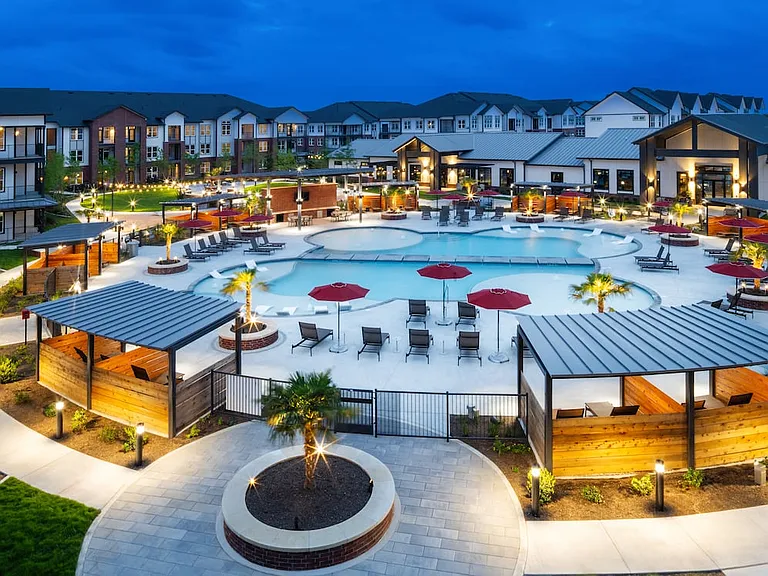Resort-style pool with cabanas