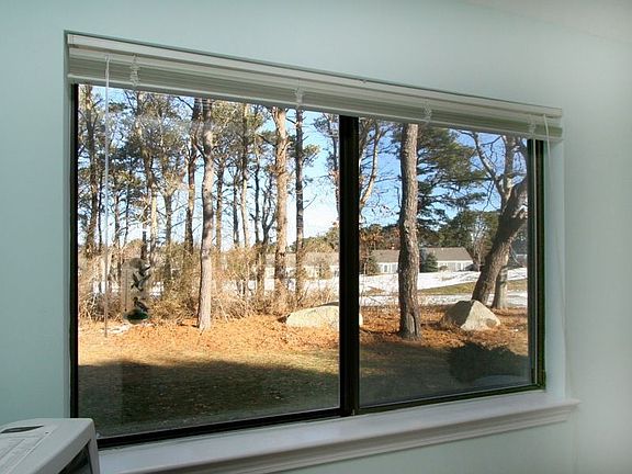 A peek of the golf course and the privacy created by abutting woods.