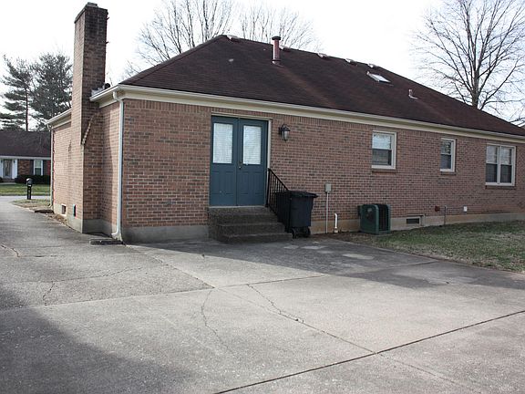 Back view of house, large patio area.