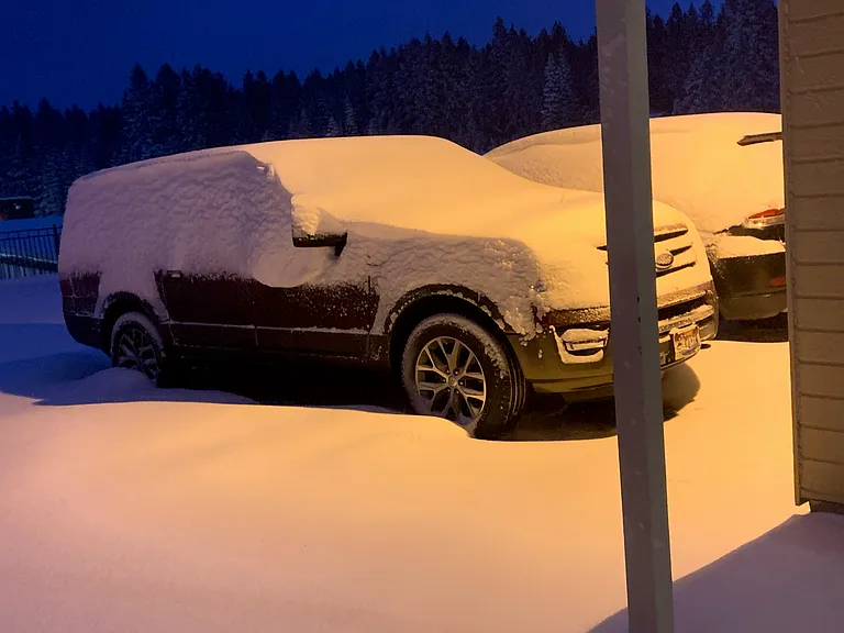 Parking space in front of condo, winter