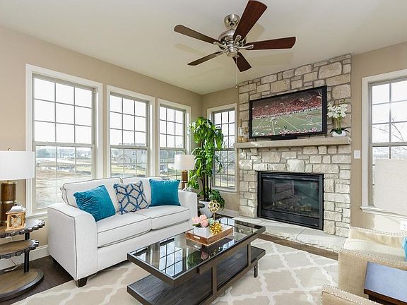 Hearth Room with Floor to Ceiling Gas Fireplace