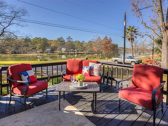 Large front porch offers serene views of the Lake!