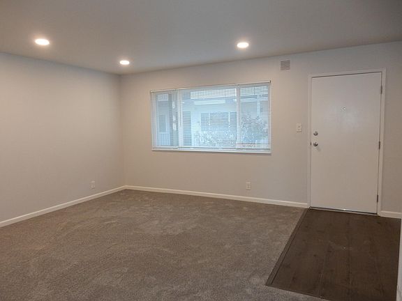 Living room - new carpet, paint and recessed lighting