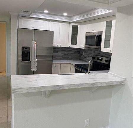 3rd image of 1508 SE Royal Green Cir APT E206