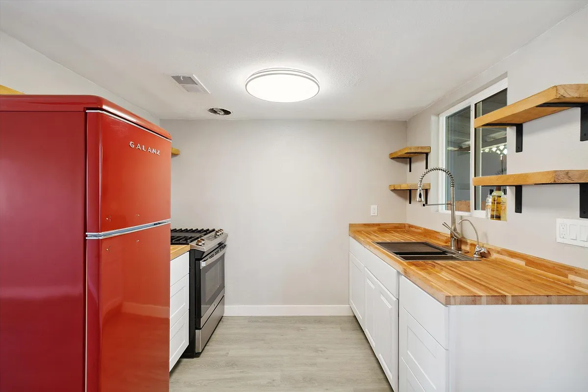 Brand new retro refrigerator with custom cut countertops and shelves. - 327 N 16th Ave #A