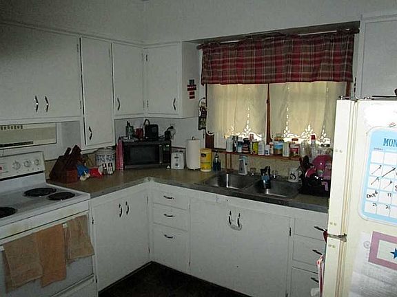 Exterior Front. Upper kitchen