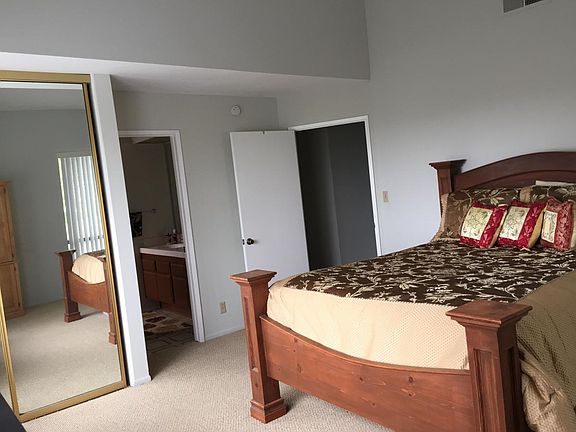 Master bedroom and entrance to en suite bathroom