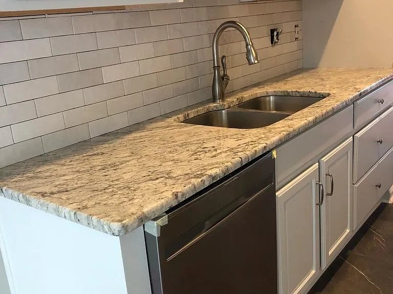 New cabinets, granite, backsplash, stainless steel appliances. New flooring