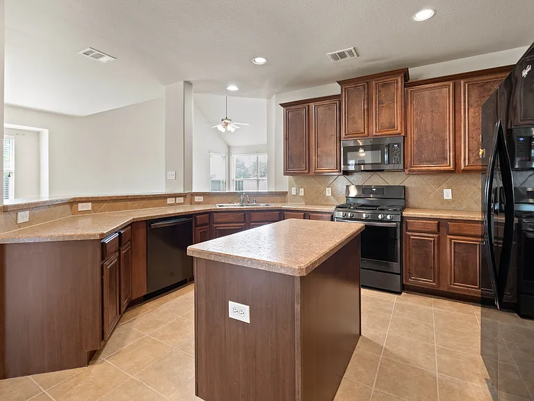 9716 Mulligan Dr — Photo 10